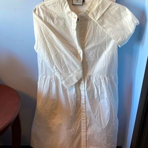 White Tukernuck below the knee cotton dress.  Never worn.  No tags.